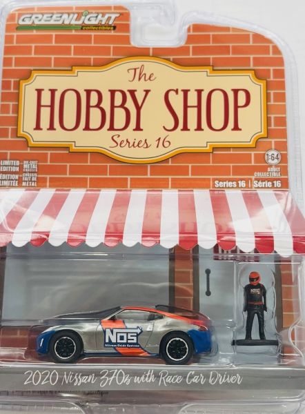 GREEN97160-F-GRIS - NISSAN 370Z 2020 Grau mit Fahrer aus der THE HOBBY SHOP-Serie in Blisterverpackung. - 1