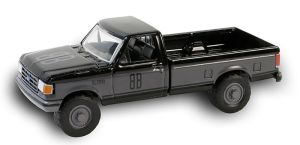 GREEN28150-E - FORD F-150 XL 1990 schwarz aus der Serie BLACK BANDIT unter Blisterverpackung.